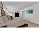 Large main bedroom with a king-size bed and TV at 117 Eagleview Loop, Davenport, FL 33837