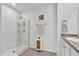Bathroom with walk-in shower and double vanity at 117 Eagleview Loop, Davenport, FL 33837