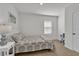 Comfortable bedroom with a queen-size bed and window coverings at 117 Eagleview Loop, Davenport, FL 33837