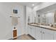 Double vanity bathroom with granite countertop at 117 Eagleview Loop, Davenport, FL 33837