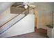 Bright living room with staircase and high ceilings at 3478 Westchester Square Blvd # 202, Orlando, FL 32835