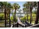 Peaceful boardwalk path leading to a lake at 3478 Westchester Square Blvd # 202, Orlando, FL 32835