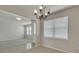 Bright dining room with view into living room at 8217 De Haven Street, Orlando, FL 32832