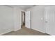 Bedroom with door to another room and double door closet at 8217 De Haven Street, Orlando, FL 32832