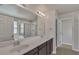 Double vanity bathroom with soaking tub and shower at 8217 De Haven Street, Orlando, FL 32832