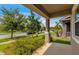 Covered porch with view of the street and neighborhood at 8217 De Haven Street, Orlando, FL 32832