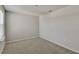 Cozy bedroom with neutral wall paint and carpet at 8217 De Haven Street, Orlando, FL 32832