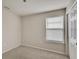 Small bedroom with window and closet at 8217 De Haven Street, Orlando, FL 32832