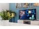 Living room with flat-screen TV showing Disney's Soul at 2428 Dubai St, Kissimmee, FL 34747