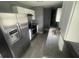 Modern kitchen featuring stainless steel appliances and granite countertops at 830 Wooden Blvd, Orlando, FL 32805