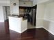 Modern kitchen with granite countertops and stainless steel appliances at 3480 Soho St # 201, Orlando, FL 32835