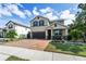 Two-story house with a two-car garage at 5200 Landmark Dr, St Cloud, FL 34771