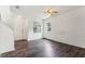 Spacious living room with dark gray laminate floors at 2548 Lyndscape St, Orlando, FL 32833