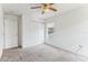 Empty bedroom with carpeted floor and double doors at 2548 Lyndscape St, Orlando, FL 32833