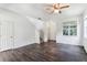 Living room with laminate flooring and access to the stairs at 2548 Lyndscape St, Orlando, FL 32833