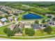 Aerial view of neighborhood with pond at 2548 Lyndscape St, Orlando, FL 32833
