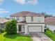Two-story house with attached garage at 2548 Lyndscape St, Orlando, FL 32833