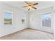 Bedroom with ceiling fan and multiple windows at 2548 Lyndscape St, Orlando, FL 32833