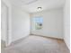 Empty bedroom with carpeted floor and window at 2548 Lyndscape St, Orlando, FL 32833