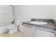 Bathroom with a shower, toilet and vanity at 2548 Lyndscape St, Orlando, FL 32833