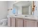 Bathroom with double vanity, toilet and mirror at 2548 Lyndscape St, Orlando, FL 32833