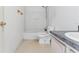 Bathroom with tub, toilet and vanity at 2548 Lyndscape St, Orlando, FL 32833