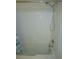 Clean bathroom with a shower/tub combo and white tile at 6320 Raleigh St # 604, Orlando, FL 32835