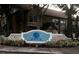 Community entrance sign for Azur, a well maintained building with landscaping at 6320 Raleigh St # 604, Orlando, FL 32835
