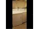 Stackable washer and dryer in a small laundry closet at 6320 Raleigh St # 604, Orlando, FL 32835