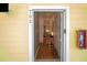 Bright condo entryway with wood floors and access to living spaces at 703 Lucaya Loop # 1103, Davenport, FL 33897