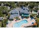 Aerial view of community pool, clubhouse, and recreational amenities at 703 Lucaya Loop # 1103, Davenport, FL 33897
