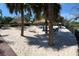 Relaxing beach area with lounge chairs and umbrellas at 703 Lucaya Loop # 1103, Davenport, FL 33897
