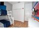 ' bedroom with bunk beds, ample closet space and TV at 703 Lucaya Loop # 1103, Davenport, FL 33897