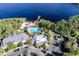 Resort area featuring pool, lake, and parking at 703 Lucaya Loop # 1103, Davenport, FL 33897