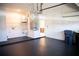Garage with laundry area, utility sink, and ample storage at 573 Hummingbird Ct, Kissimmee, FL 34759