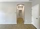 Hallway with tile floors and arched entryway at 15106 Ovation Dr, Winter Garden, FL 34787
