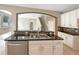 Modern kitchen with granite countertops and stainless steel appliances at 15106 Ovation Dr, Winter Garden, FL 34787