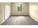 Spacious bedroom with large window and closet at 15106 Ovation Dr, Winter Garden, FL 34787