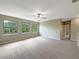Open and airy bedroom with three large windows at 15106 Ovation Dr, Winter Garden, FL 34787