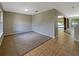 Living room with carpet and tile floors at 15106 Ovation Dr, Winter Garden, FL 34787