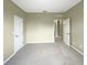 Spacious bedroom with neutral walls and doors at 15106 Ovation Dr, Winter Garden, FL 34787