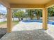 Inviting pool area with a covered patio at 15106 Ovation Dr, Winter Garden, FL 34787