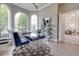 Spacious home office with built-in shelving and large windows at 16828 Vinci Way, Montverde, FL 34756