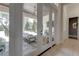Outdoor patio with glass doors overlooking the pool and backyard at 16828 Vinci Way, Montverde, FL 34756