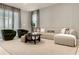 Spacious living room featuring a large sectional sofa and comfortable armchairs at 4424 Kaipo Rd, Davenport, FL 33897