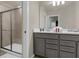 Elegant bathroom with a double vanity, a large shower, and modern fixtures at 4424 Kaipo Rd, Davenport, FL 33897