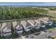 Aerial view of a row of two-story houses at 4424 Kaipo Rd, Davenport, FL 33897