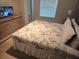 King-size bedroom with dresser and TV at 3211 Gold Ln, Kissimmee, FL 34747