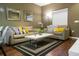 Living room with neutral decor, modern sofa, and coffee table at 3211 Gold Ln, Kissimmee, FL 34747
