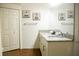 Double sink bathroom with granite countertop and separate closet at 3211 Gold Ln, Kissimmee, FL 34747